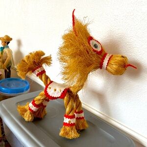 Can’t live without adorable made from rope horse. Quirky/cute face. Felt trim